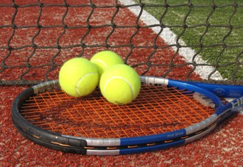 This photo of a display of tennis equipment - tennis racquet and balls ready and waiting on the tennis court - was taken by Sanja Gjenero of Zagreb, Croatia.  Tennis anyone?